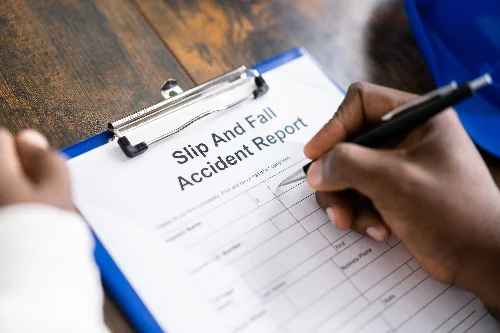 Image of a Walmart slip and fall accident report being filled out