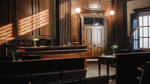 Supreme Court of Law and Justice Trial Stand. Courthouse Before Civil Case Hearing Starts. Grand Wooden Interior with Judge's Bench, Defendant's and Plaintiff's Tables.