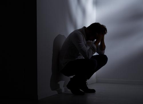 Person contemplating suicide at a mental health facility