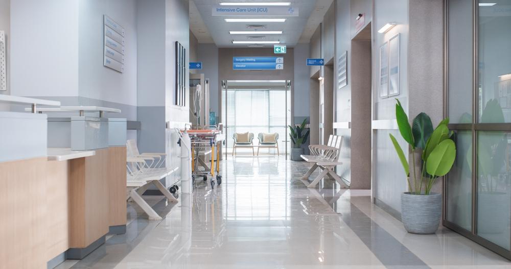 Empty hospital corridor leading to the intensive care unit, symbolizing loss and accountability in Florida care facilities