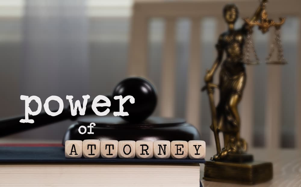 Words POWER OF ATTORNEY composed of wooden dices.
