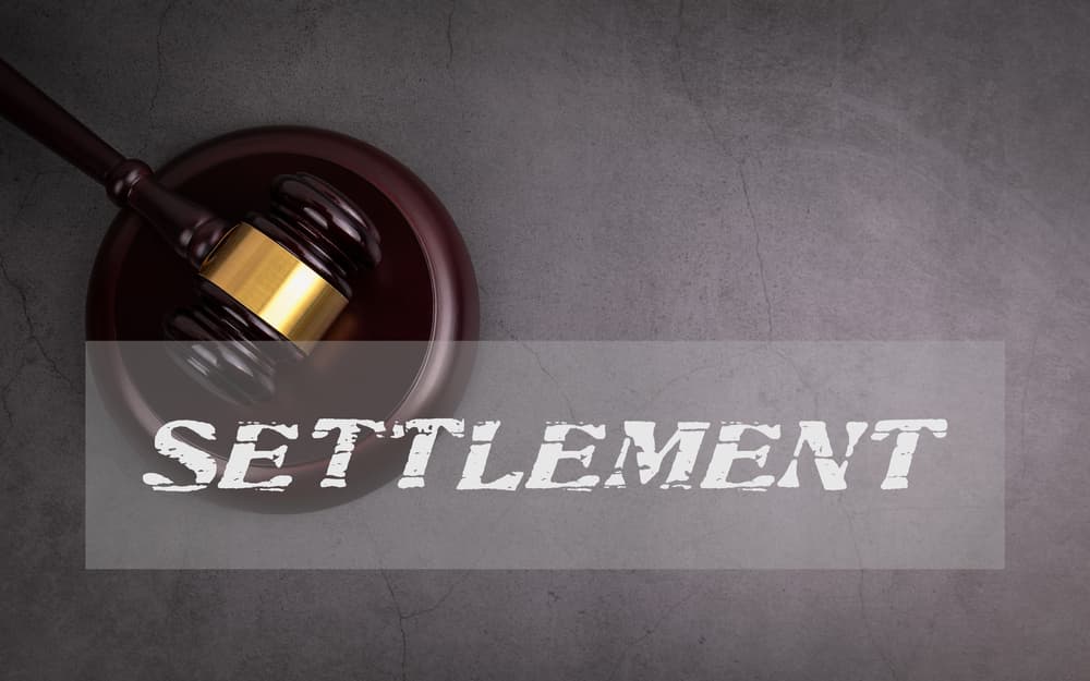 Judge's hammer on a concrete background.